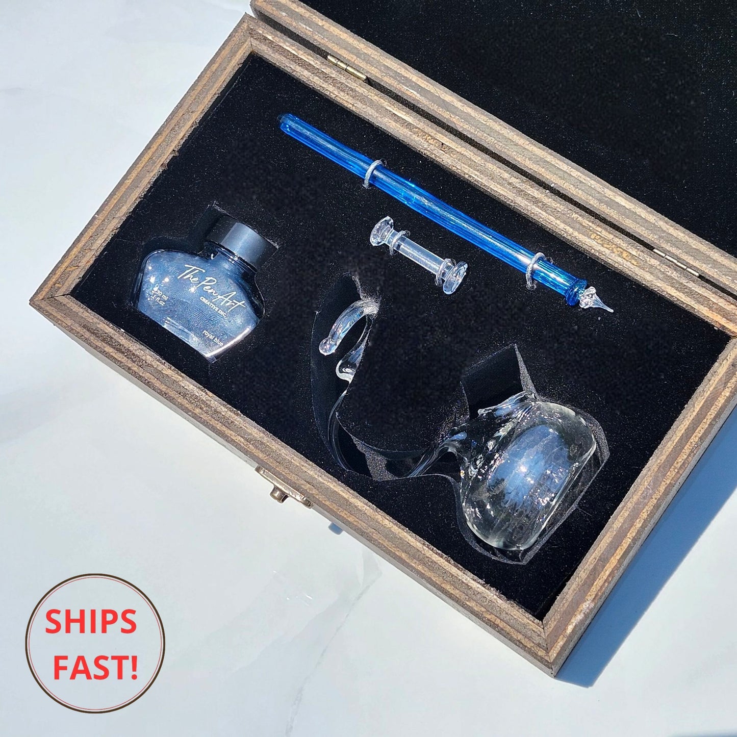 Handmade Cerulean glass dip pen in bold blue with elegant holder – a refined writing instrument for poetic expression and clarity of thought.