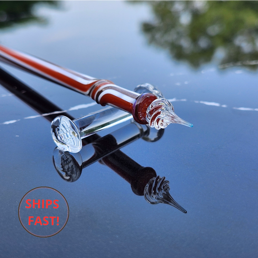 Elegant Isareth wedding gift pen photographed with ink cleaning orb and accessories