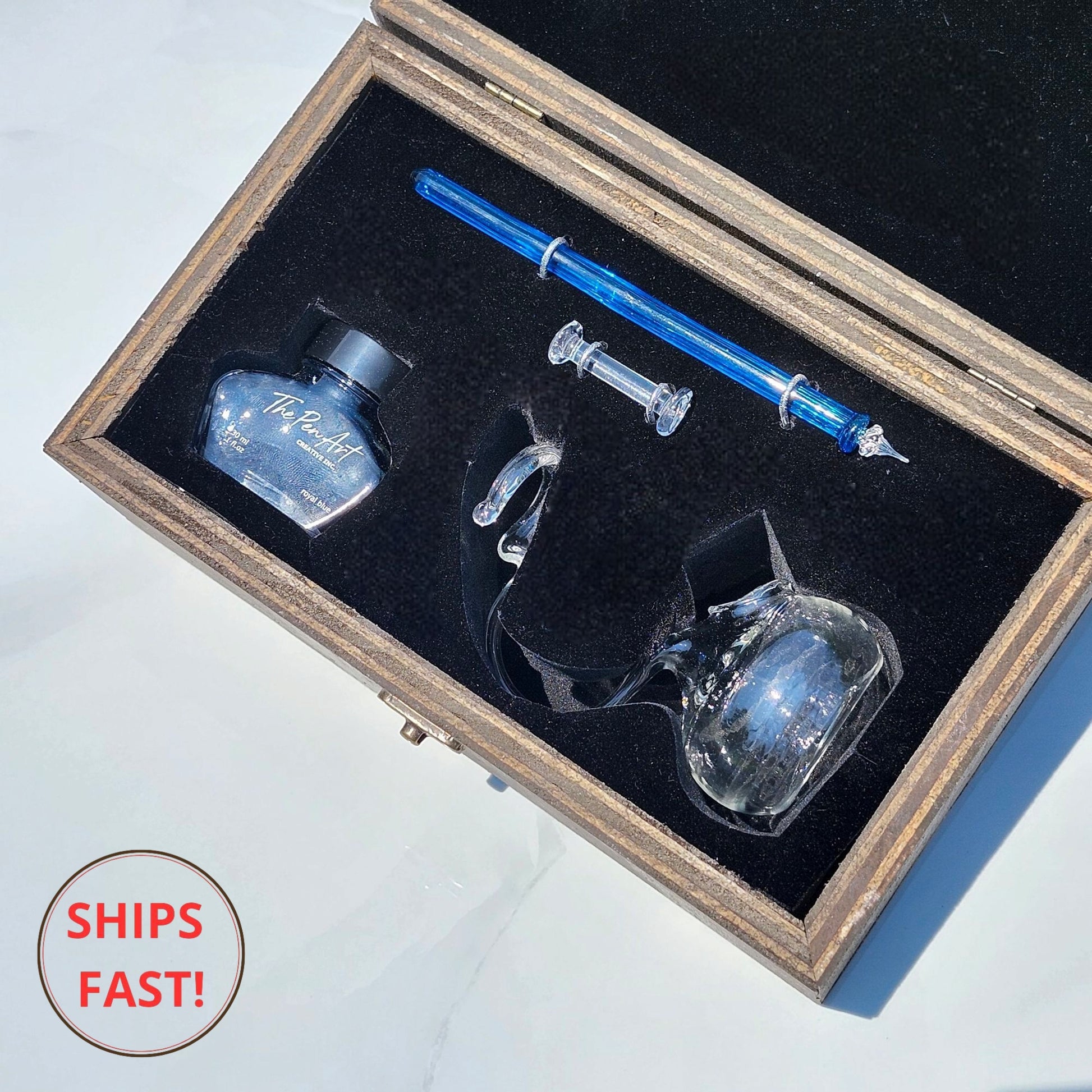 Handmade Cerulean glass dip pen in bold blue with elegant holder – a refined writing instrument for poetic expression and clarity of thought.