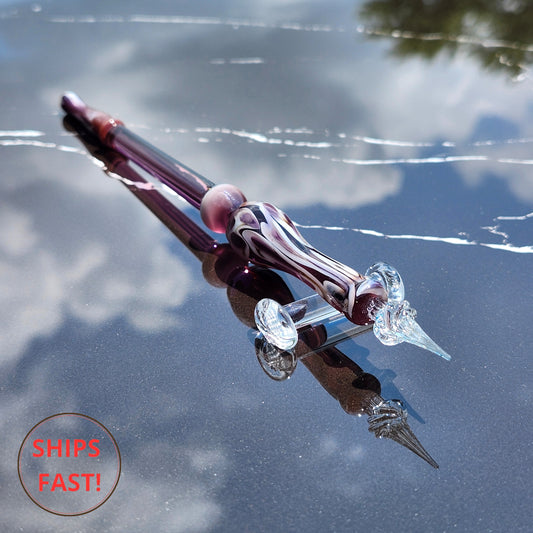 Handcrafted Benedict pen in deep red-brown glass, perfect for personalized anniversary or retirement gifts.