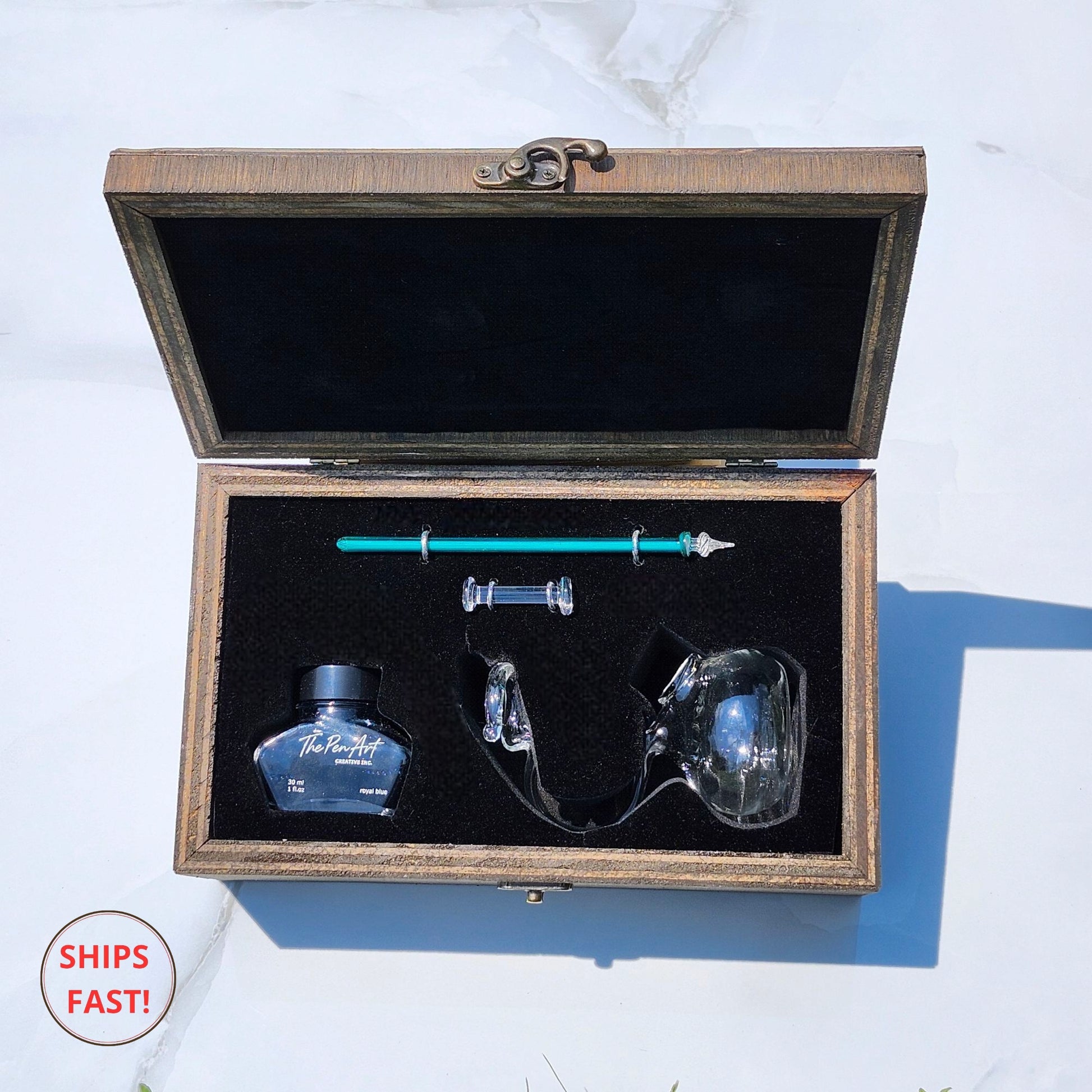 Handcrafted turquoise glass pen set displayed in a personalized wooden gift box