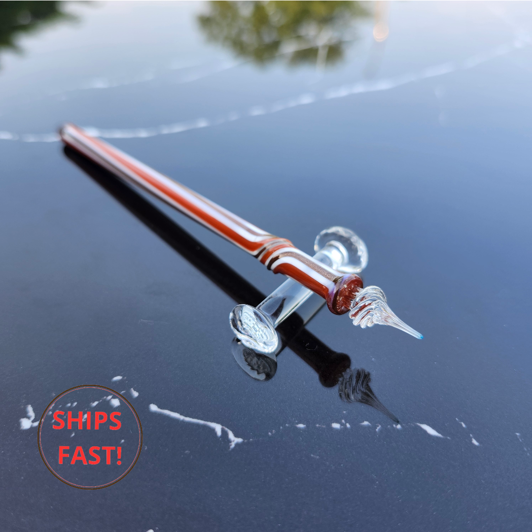 Isareth pen set with ink cleaning orb and pen rest in luxury wooden box.