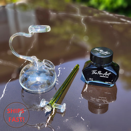 Soft green glass pen with smooth handcrafted nib and elegant body.